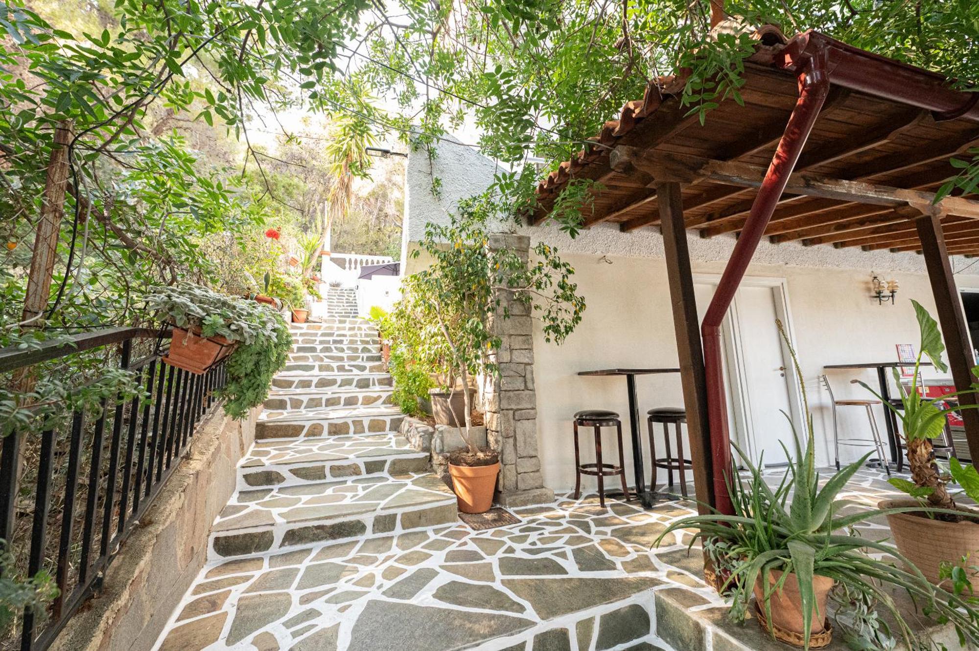 Lions 2 & Apartments, Poros Island. *