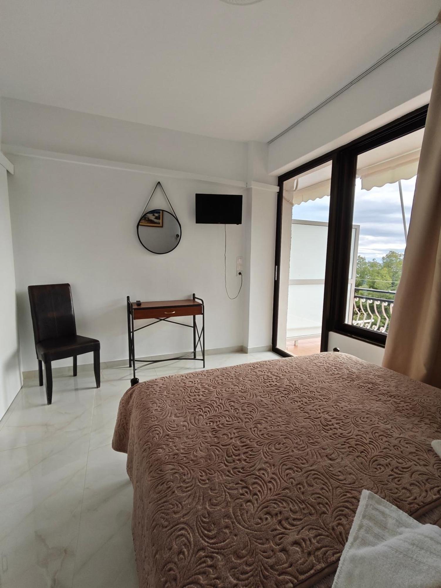 Lions 2 & Apartments, Poros Island. *